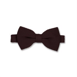 A brown knitted bow tie with a textured pattern, suitable for formal or casual wear.