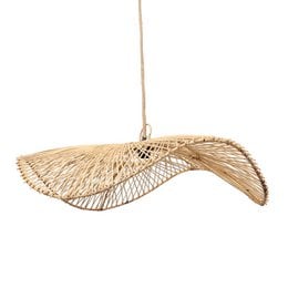 A large, natural-colored pendant light made of woven rattan material, with a unique, organic shape that resembles a bird or fish. The pendant light is suspended from the ceiling and provides warm, ambient lighting.