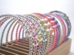 YUKO B HEADBAND OFFER. Wooden display including the entire collection of headbands, 2 per model and 34 in total