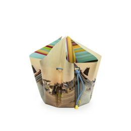 Folding vase / Bow vase made of wood, featuring a colorful striped pattern inspired by the beaches of the Netherlands.