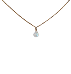Delicate gold-filled or sterling silver necklace with a natural rainbow moonstone pendant. The moonstone has a soft, iridescent glow and a unique rainbow-like shimmer.