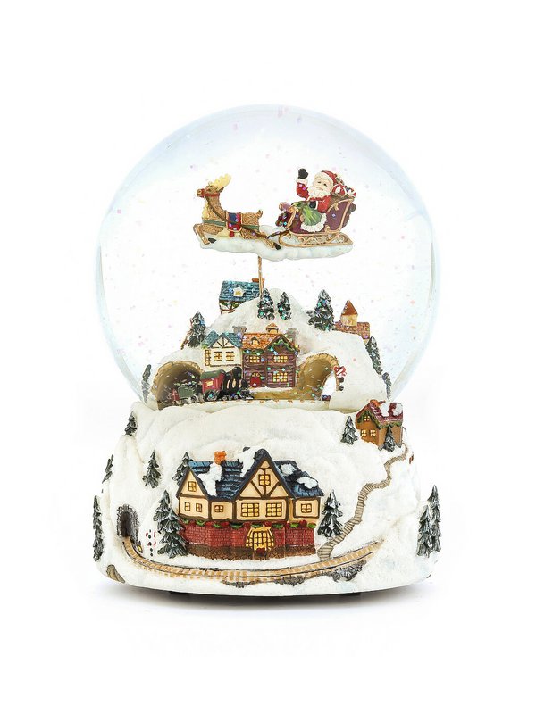 The Great Snow Globe "Juleaften, julemanden er næsten her!", Et lille damptog passerer gennem landsbyen og