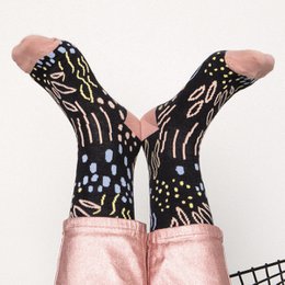 Pink and purple patterned socks with a textured design.