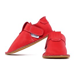  Red suede slippers with Santa Claus design, suitable for indoor wear. Features adjustable velcro straps for a comfortable fit.