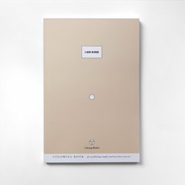 A beige hardcover book titled "I Am Kind" with a simple white label on the cover.