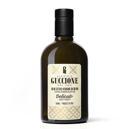 Premium extra virgin olive oil in a 500ml bottle with a white label and gold accents.