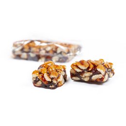 Vegan Caribbean peanut nougat with pistachios, a sweet and nutty toffee-like confection.