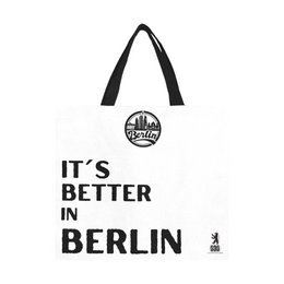 A large white shopping bag with black text that says "IT'S BETTER IN BERLIN" and a circular logo. The bag appears to be made of a durable material and has two black handles.