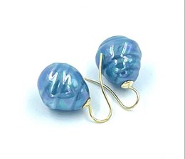 Baroque pearl earrings in the color lapis lazuli