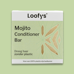 Olive-based conditioner bar in a round black and white tin container.