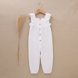  White baby girl jumpsuit with ruffles, available in sizes 3 years to 12 years.