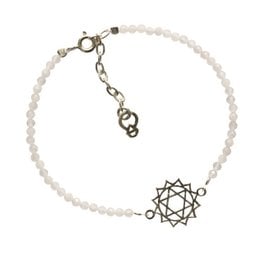 Silver-toned charm bracelet with white beads and a heart chakra charm.
