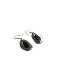 Elegant teardrop-shaped stud earrings with a dark stone center and a silver-tone metal frame.