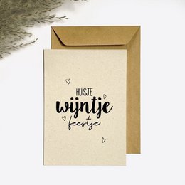 Postcard with text "Hoiste wintje foarje" in a handwritten style font on a cream-colored background, with a brown envelope.