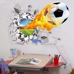 A 3D wall sticker depicting a soccer ball on fire, breaking through a wall. The sticker features vibrant colors and a dynamic, explosive design.