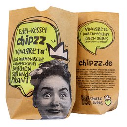 Potato chips with vinegar flavor, packaged in a bag with a smiling face on the front.