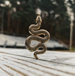 Spilla in metallo dorato "Serpente"
