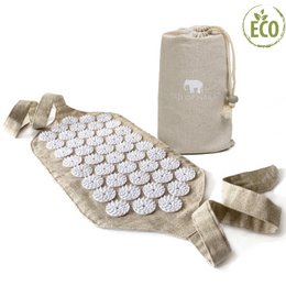 Beige yoga mat with white circular patterns, designed for comfort and grip during yoga practice.