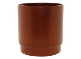 A round, terracotta-colored plant pot with a matte finish. Suitable for indoor plants.