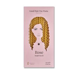 Long, wavy pasta in the shape of a woman's hair in a rose-gold color. Pasta made from high-quality ingredients.