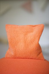  Colorful sensory beanbag filled with cherry pits, suitable for tactile stimulation and sensory play.