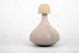 Seaweed-infused bath gel in a unique, rounded bottle with a cap. Made with natural ingredients for a relaxing, spa-like experience.