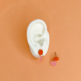 Gestippelde acryloorbellen in oranje ijsroze