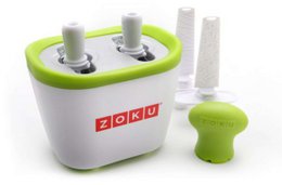  White and green ice cream maker with two molds for making quick popsicles.