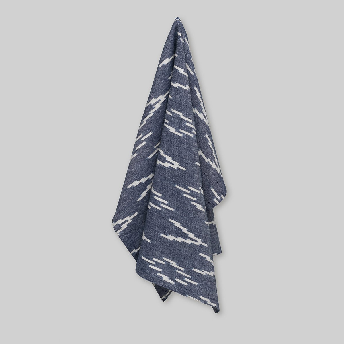 Tea towel, handwoven ikat, ecru v-pattern on navy blue