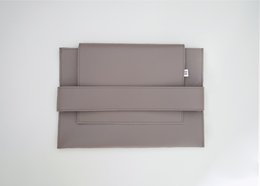 Taupe-colored laptop sleeve made of durable material, suitable for 14-inch laptops.