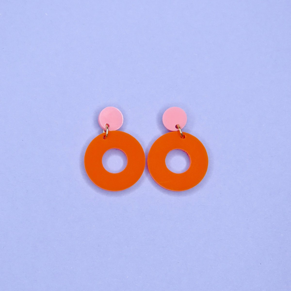 Colorblock Circle stud earrings in pink and orange