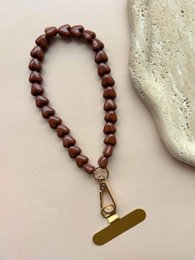 Beaded phone cord lanyard, colorful spiral rope strap, multiple color options, brass clip attachment.