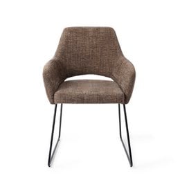 Jesper Home Yanai Dining Chair in slide black, upholstered in a soft pink fabric with a modern, minimalist design and metal frame.