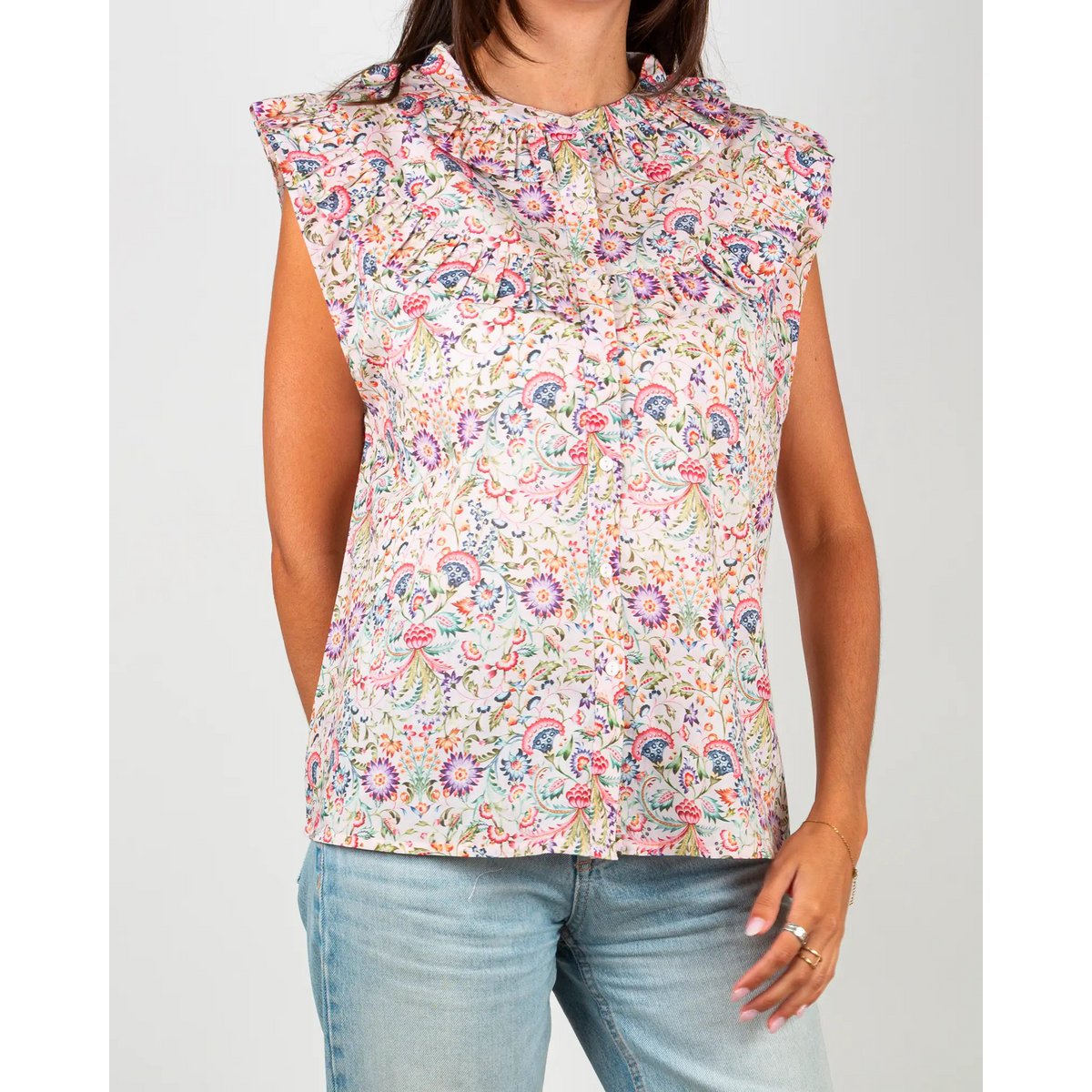 La blouse femme sans manches à volants Febre rose
