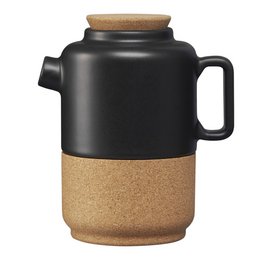 A black ceramic teapot with a cork base, designed for 2 people, with an eco-friendly stool.