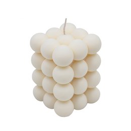  Handmade aesthetic bubble candle in a modern cube design, made of vegan materials and free from perfumes. The candle features a unique bubble-like shape and a neutral off-white color, making it a versatile decor piece for living rooms.