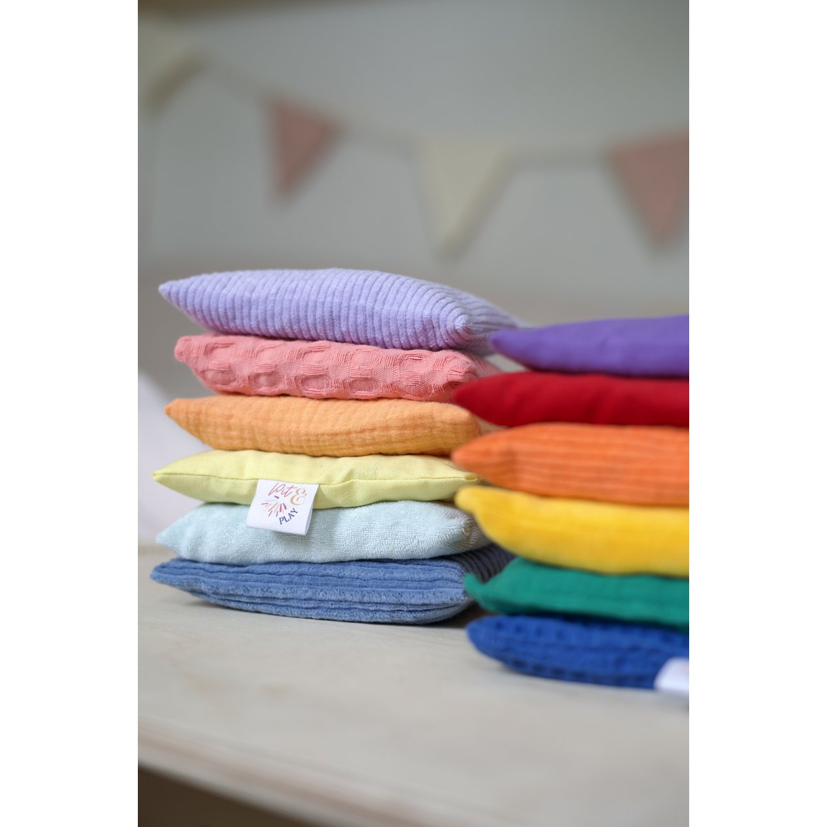 Pittenzakjes pastel, kirschkern kissen, sensory beanbag