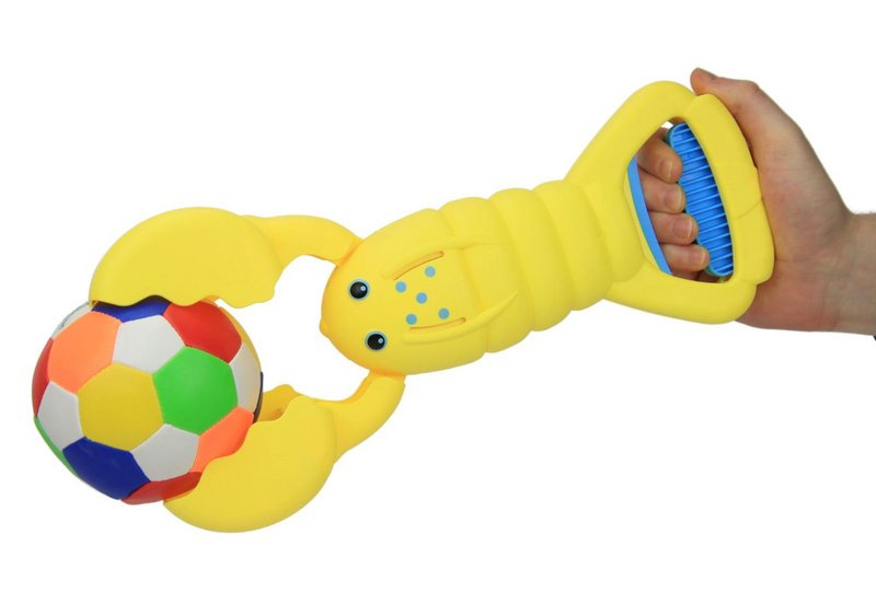 Sand Snapper, recogedor de arena amarillo con diseño de cangrejo