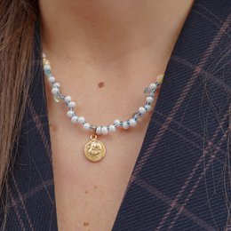 Gold plated pendant necklace with glass beaded chain. Elegant and stylish accessory.