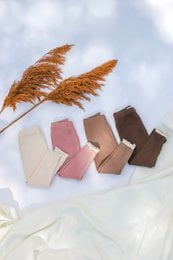 Soft, comfortable leggings in a variety of neutral colors including brown, mocca, pink, and cream. Suitable for babies and toddlers aged 2-5 years.