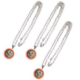 Set of 3 glass medallion necklaces with round pendant charms in an orange rham design, including fillings.