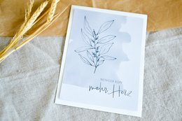 Postcard with minimalist botanical illustration and text "Less head, more heart". Suitable for greeting cards, stationery, or wall art.