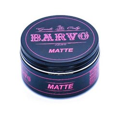 Matte hair wax in a dark blue and pink container. The product is designed to provide a matte finish to the hair.