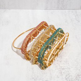Kroonluchter verfraaid met gouden Franse vlag diamanten tas