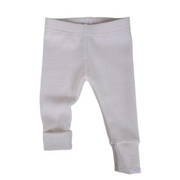Cream-colored waffle knit baby leggings with a bow detail and button accents. The leggings have a comfortable, stretchy fit and are suitable for infants and toddlers.