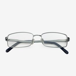 Silver-toned rectangular eyeglasses with a sleek, modern design.