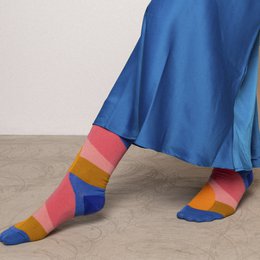 Pink and purple patterned socks with a textured design.