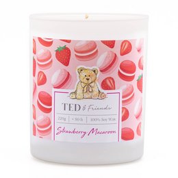 A round, tall scented candle with a strawberry macaroon fragrance. The candle has a pink and white pattern with strawberry and macaron illustrations.