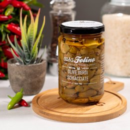 Crushed Calabrian green olives in a glass jar, 314 ML. Olives with a rich, savory flavor, perfect for cooking or snacking.