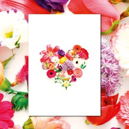 Colorful floral heart-shaped design on a postcard with flowers, including roses, daisies, and other vibrant blooms.